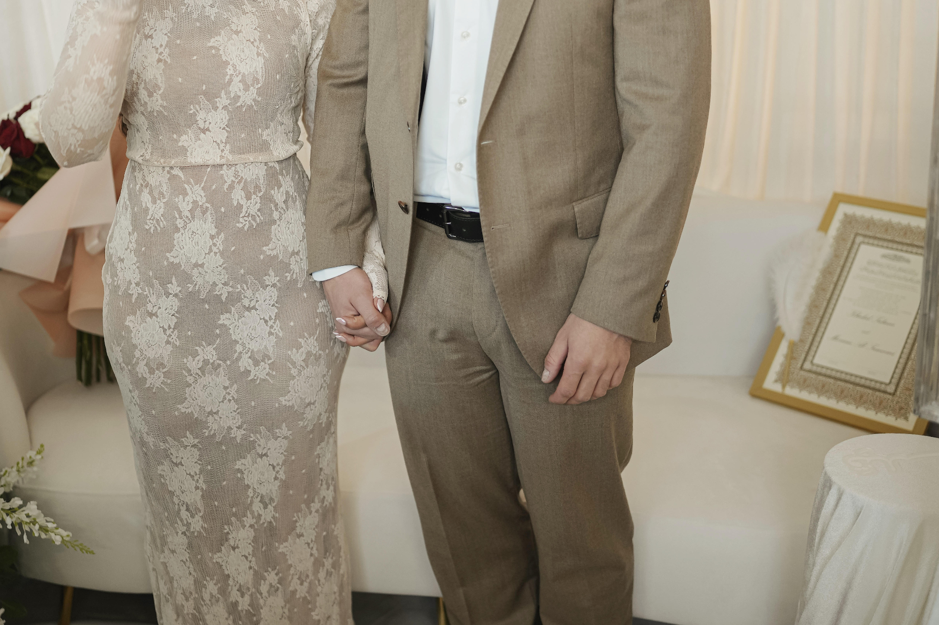 Khaled and Mariam holding hands